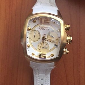 Invicta women’s gold and leather watch